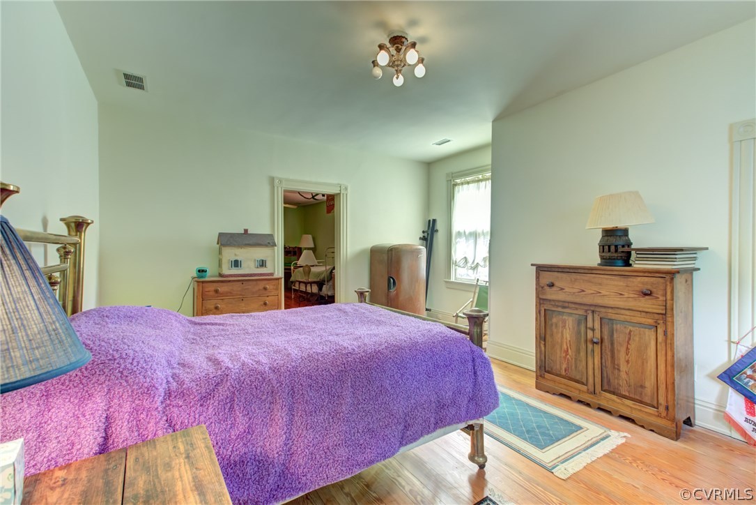 3048 River Road West Goochland, VA 23063 - Photo 28 of 49 a bed room with a bed and a dresser