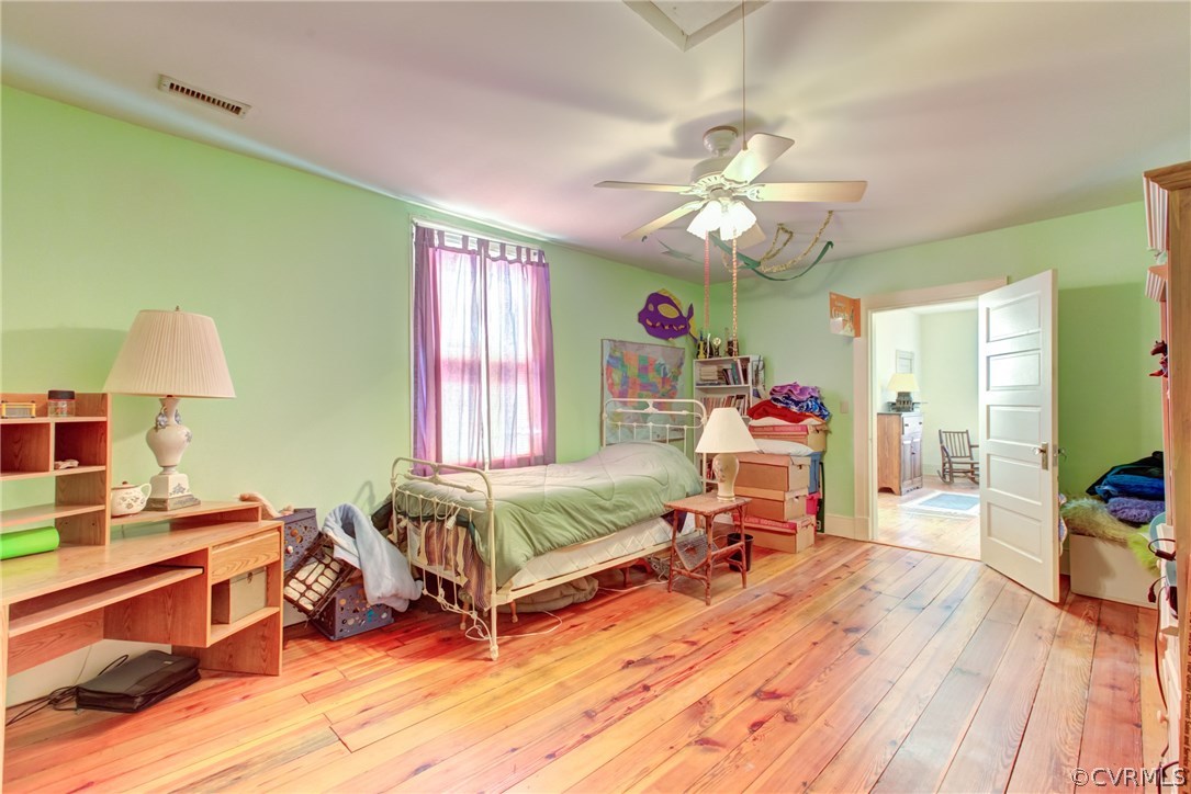 3048 River Road West Goochland, VA 23063 - Photo 29 of 49 a living room with furniture and a wooden floor