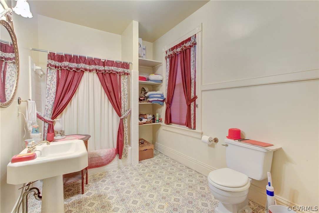 3048 River Road West Goochland, VA 23063 - Photo 35 of 49 a bathroom with a sink toilet and shower