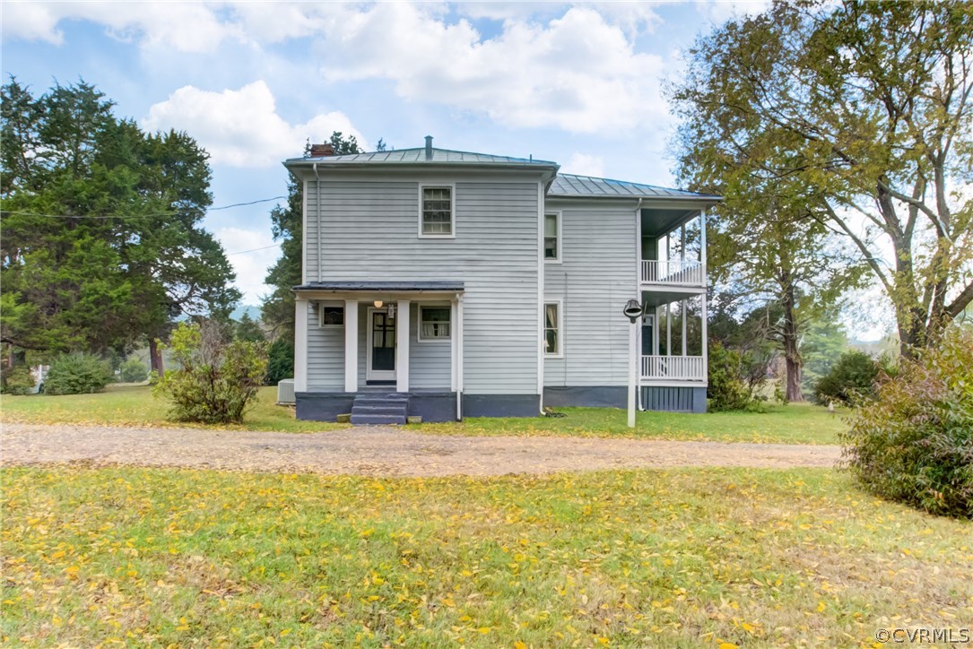 3048 River Road West Goochland, VA 23063 - Photo 38 of 49 a view of a house with a yard and a large tree