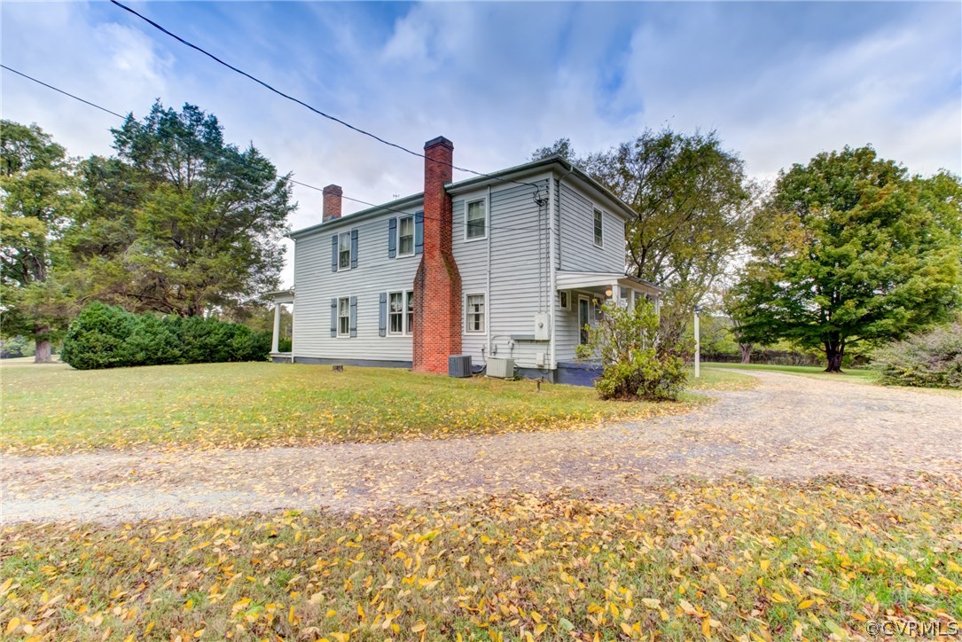 3048 River Road West Goochland, VA 23063 - Photo 41 of 49 a view of a house with backyard and trees