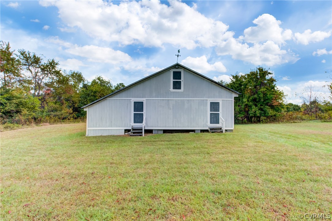 3048 River Road West Goochland, VA 23063 - Photo 43 of 49 a view of a house with a backyard