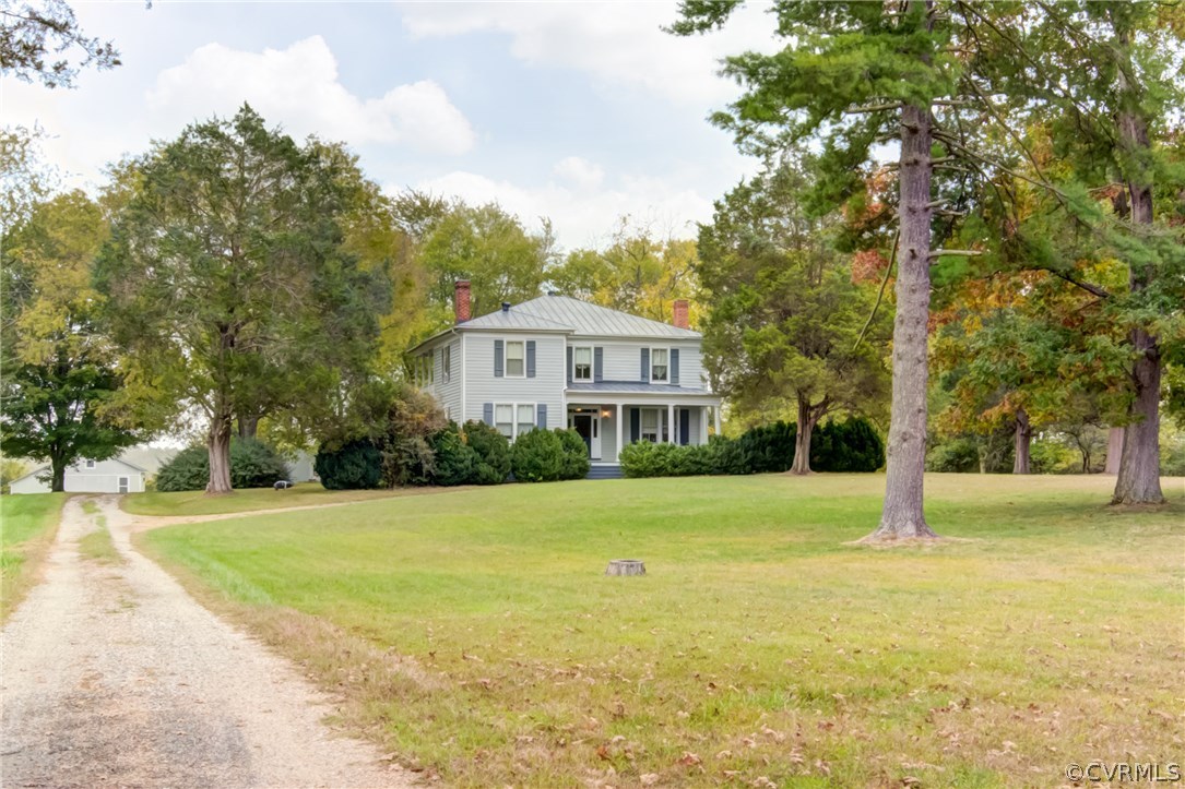 3048 River Road West Goochland, VA 23063 - Photo 47 of 49 a view of a house with a yard and palm trees