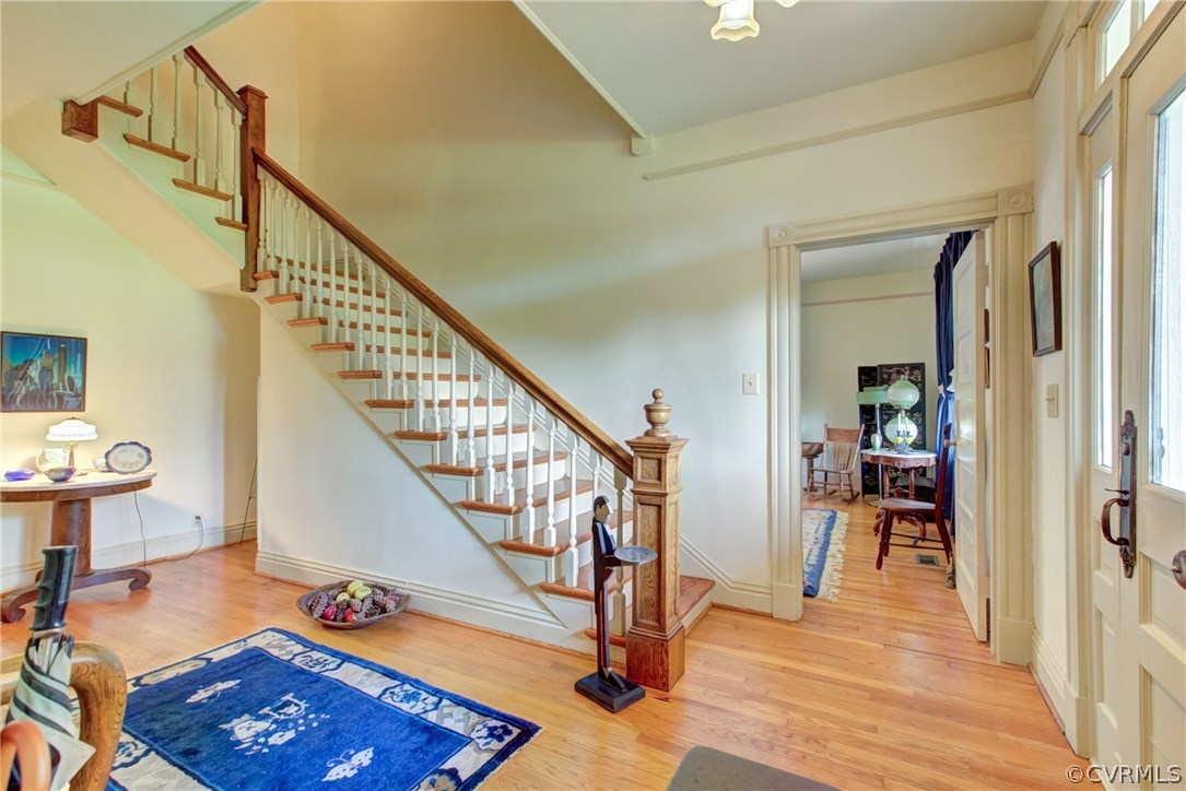 3048 River Road West Goochland, VA 23063 - Photo 6 of 49 a view of a livingroom with wooden floor and stairs