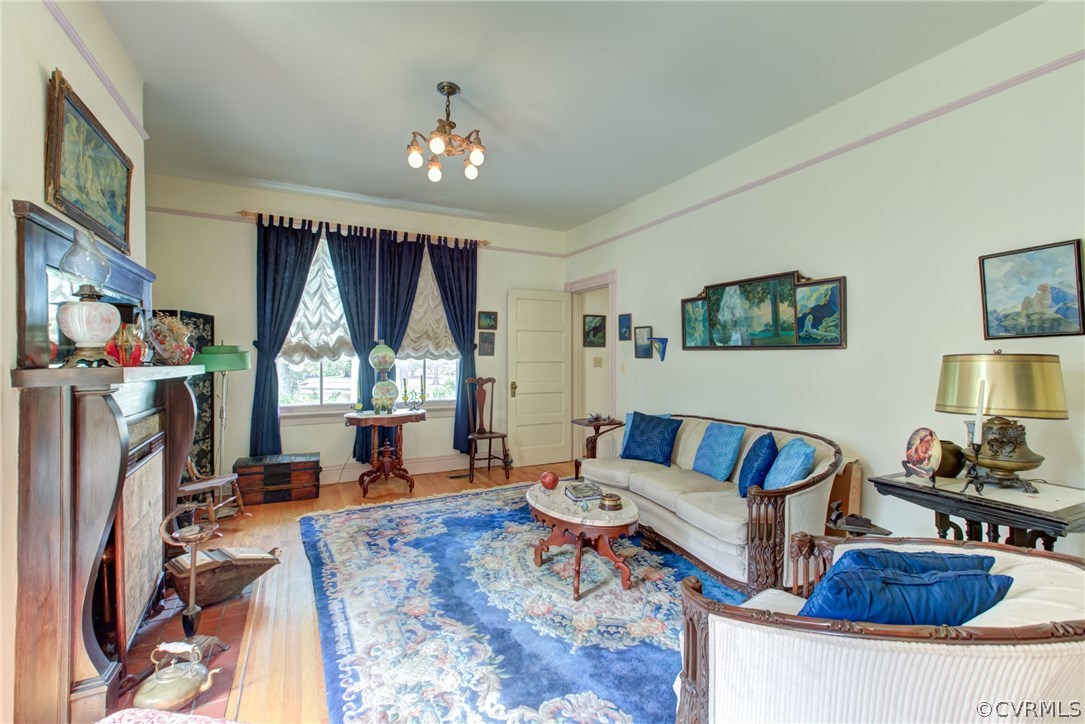 3048 River Road West Goochland, VA 23063 - Photo 10 of 49 a living room with furniture a window and a flat screen tv