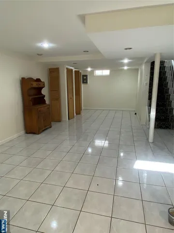 a view of a hallway with seating area