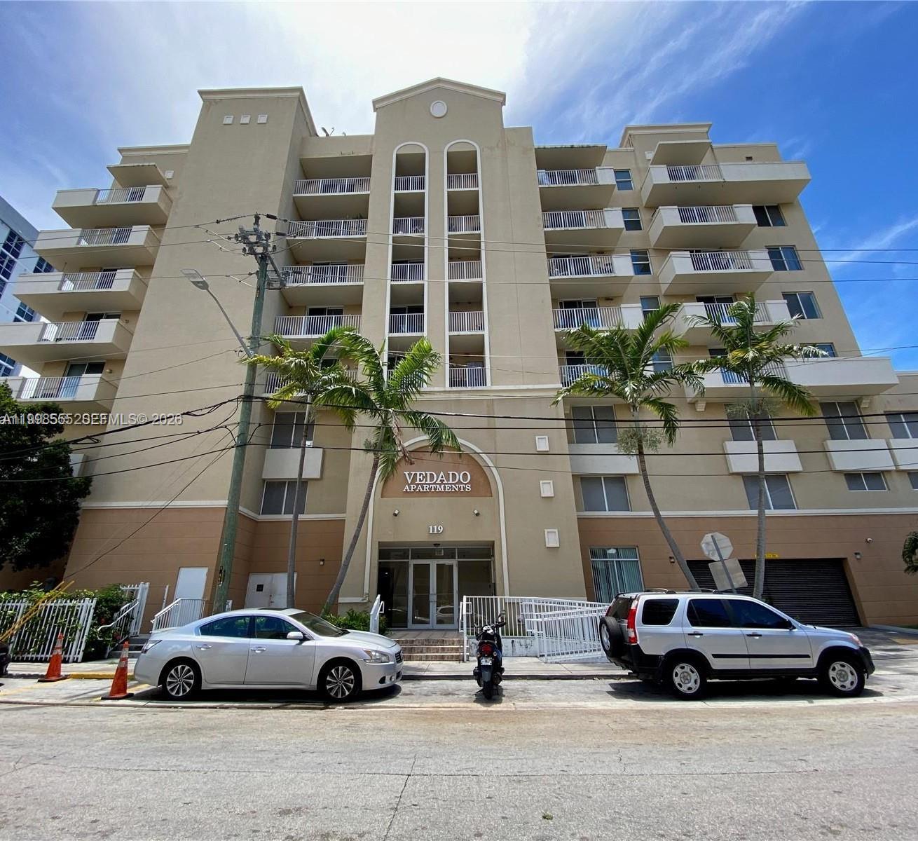 119 Southwest 6th Avenue, Unit 405 Miami, FL 33130 - Photo 1 of 23 a car parked in front of a building
