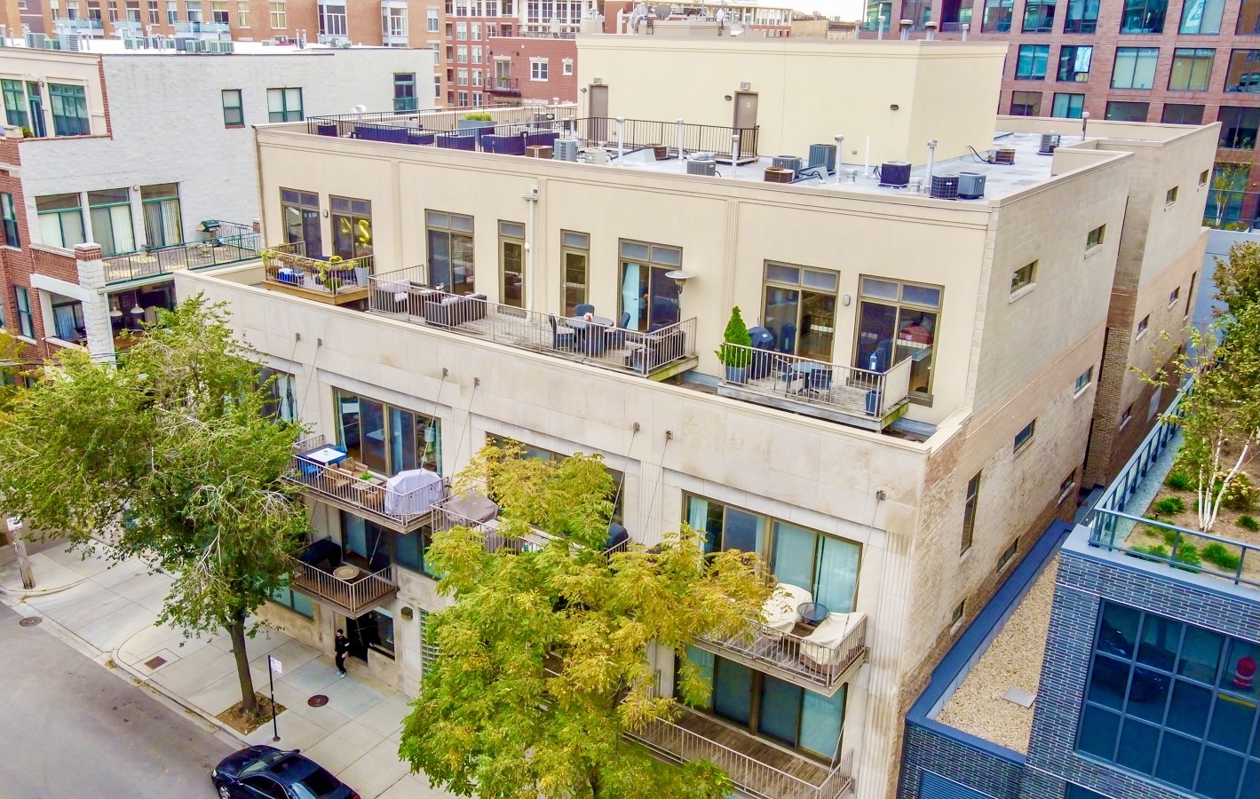 14 North Sangamon Street, Unit 403 Chicago, IL 60607 - Photo 1 of 18 an aerial view of a house with large trees