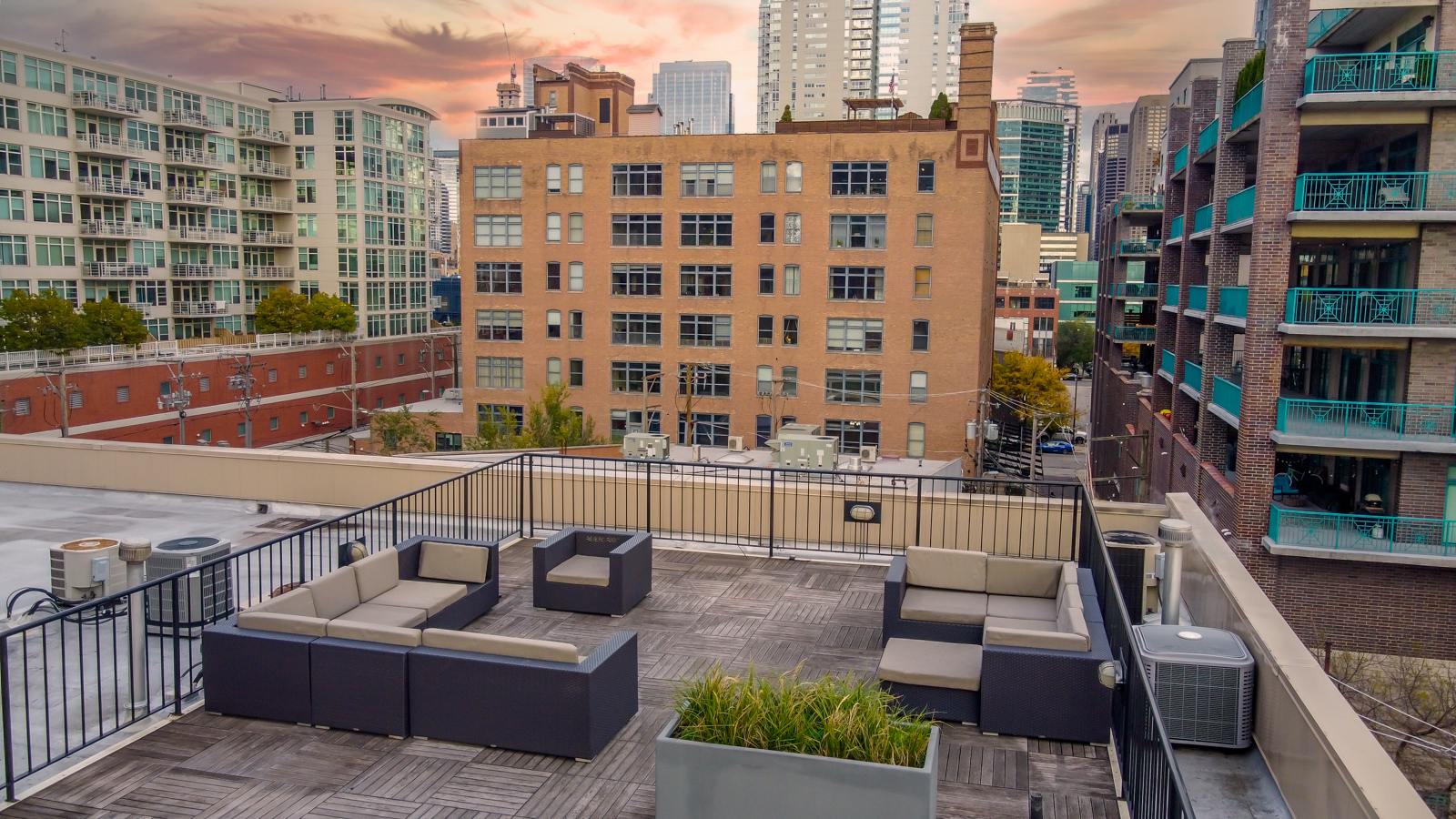 14 North Sangamon Street, Unit 403 Chicago, IL 60607 - Photo 16 of 18 a view of a tall building from a balcony