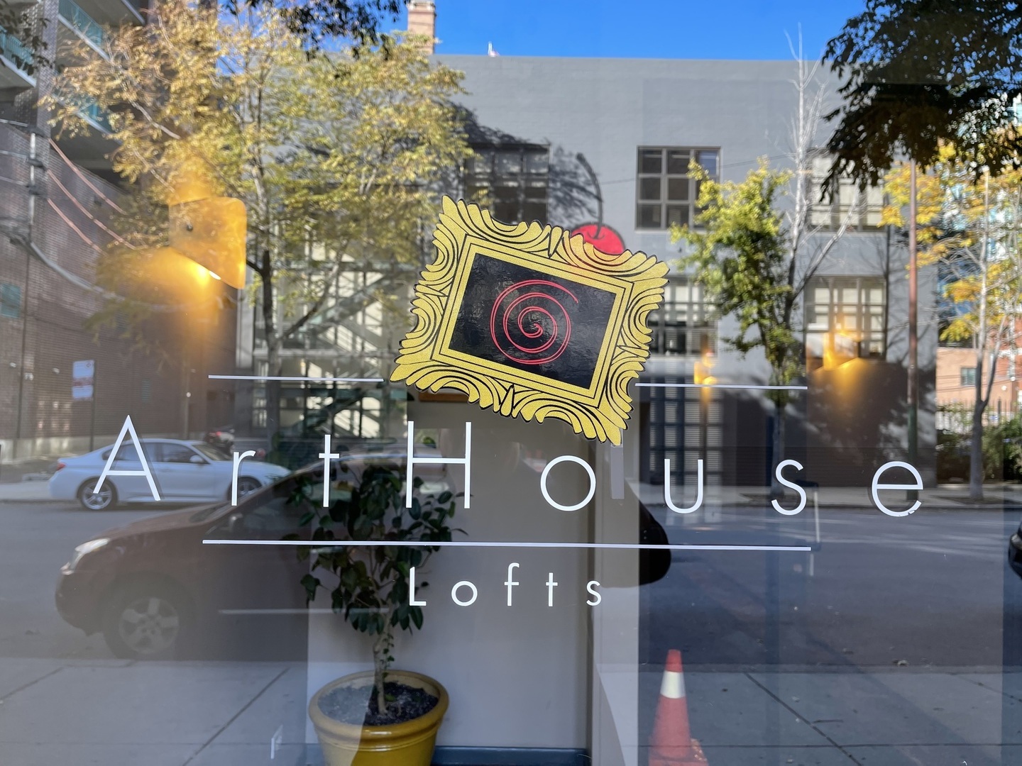 14 North Sangamon Street, Unit 403 Chicago, IL 60607 - Photo 17 of 18 a street view with tall buildings and a street sign on a wall