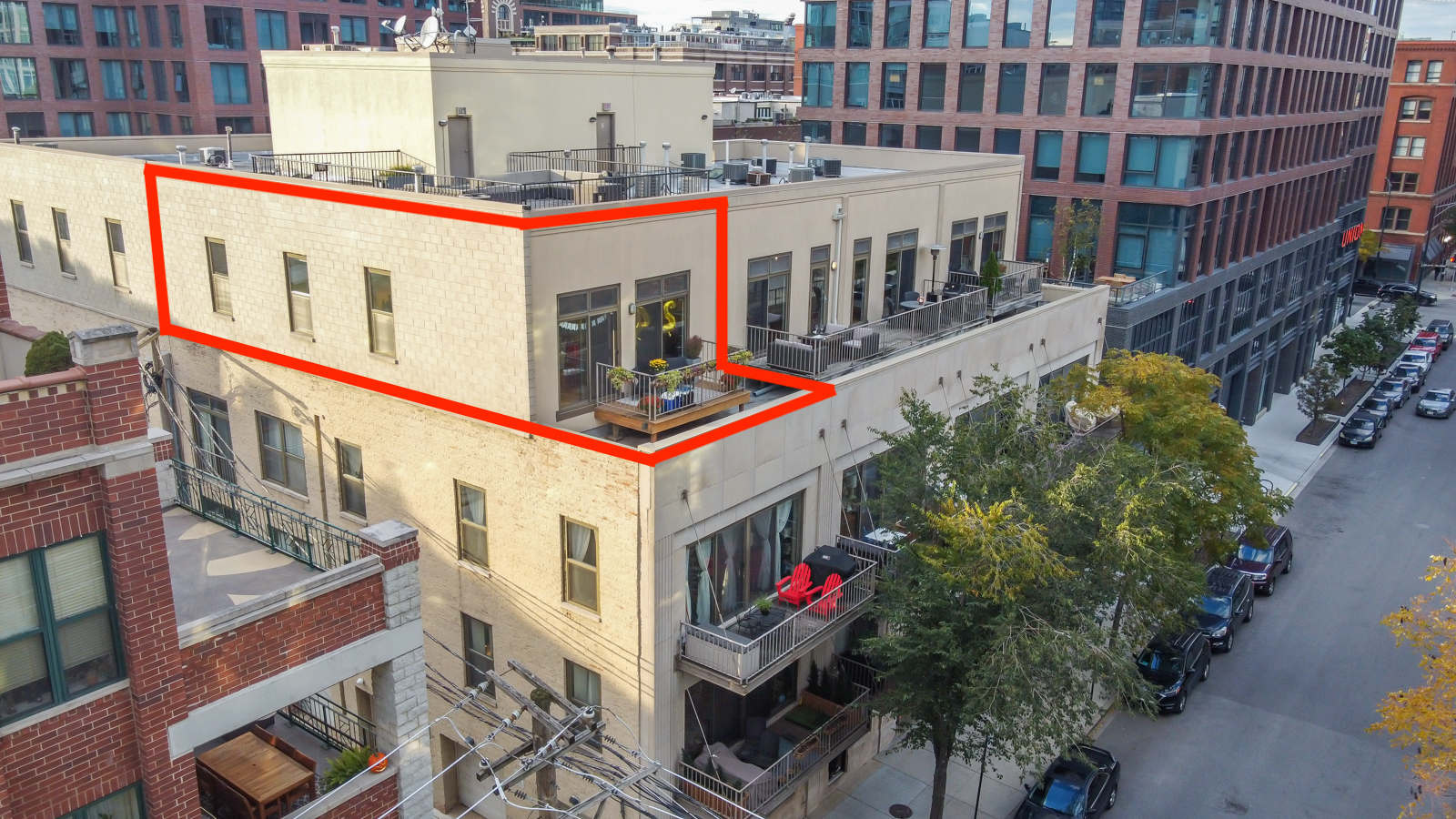 14 North Sangamon Street, Unit 403 Chicago, IL 60607 - Photo 2 of 18 a street view with tall buildings and a street sign