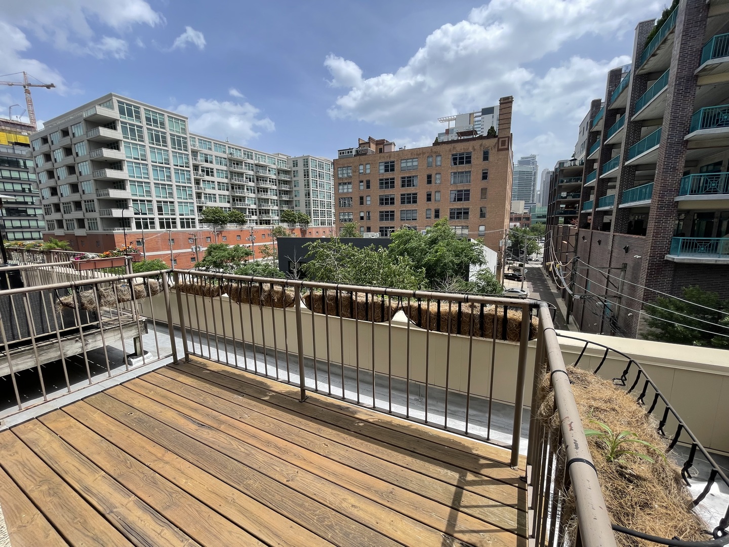 14 North Sangamon Street, Unit 403 Chicago, IL 60607 - Photo 6 of 18 a view of city from a balcony