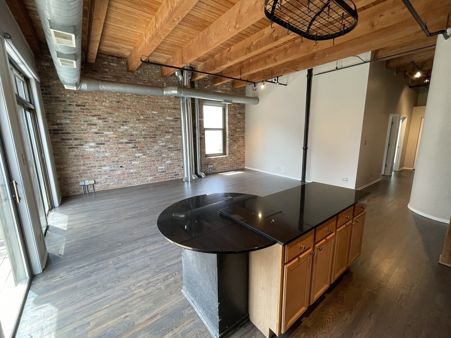 14 North Sangamon Street, Unit 403 Chicago, IL 60607 - Photo 8 of 18 a living room with wooden floor