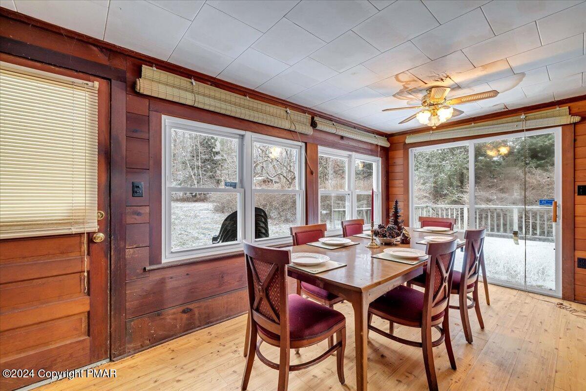 261 Merry Hill Road Mount Pocono, PA 18344 - Photo 7 of 46 261 Porch and Dining Room