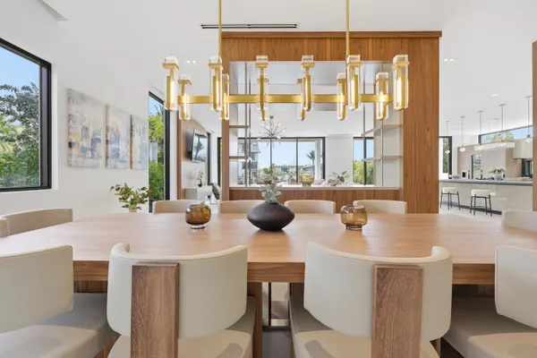 a kitchen with a table and chairs