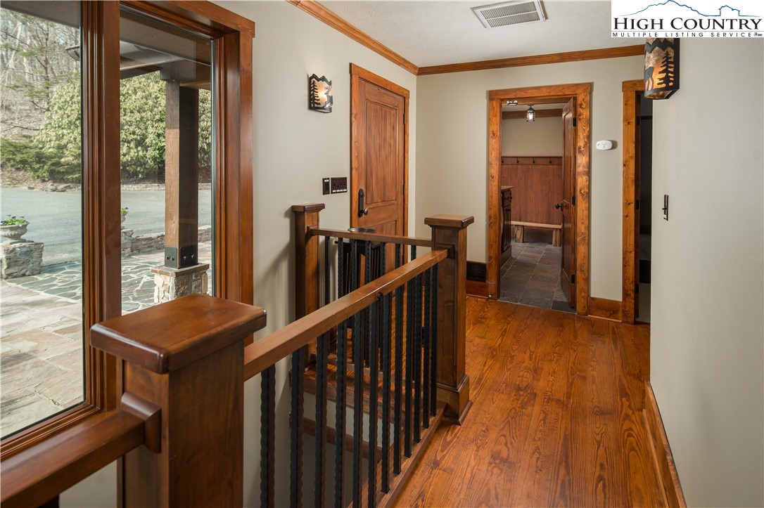 260 Beacon Hill Blowing Rock, NC 28605 - Photo 21 of 47 a view of a room with wooden floor and windows