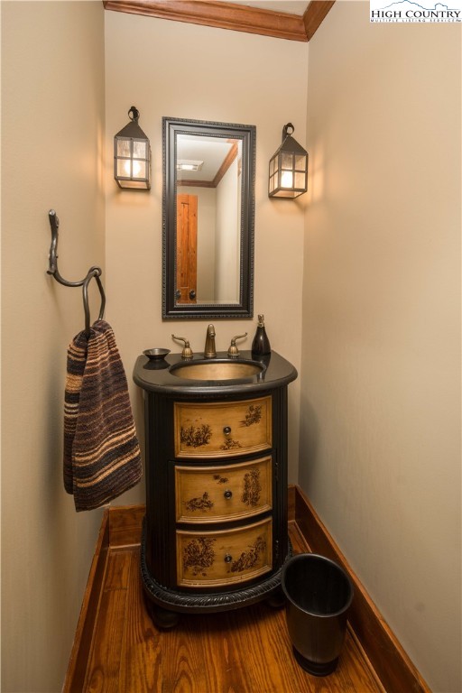 260 Beacon Hill Blowing Rock, NC 28605 - Photo 22 of 47 a bathroom with a sink and a mirror