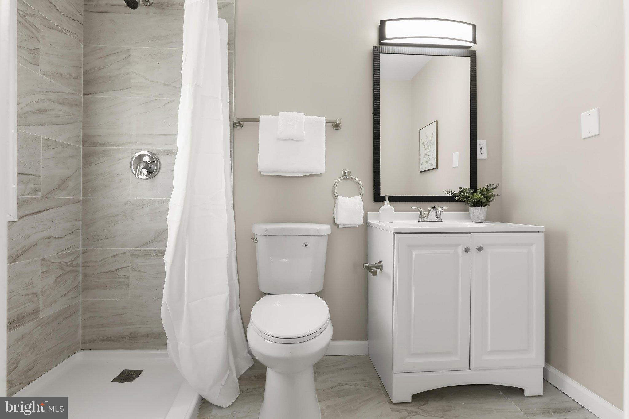 6802 Richardson Road Baltimore, MD 21207 - Photo 24 of 48 Renovated Primary En-Suite Full Bath