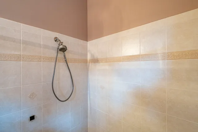 a view of a chair and table in the garden