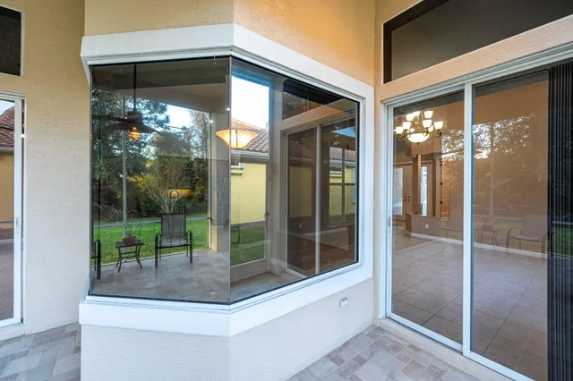 a view of a park with large trees