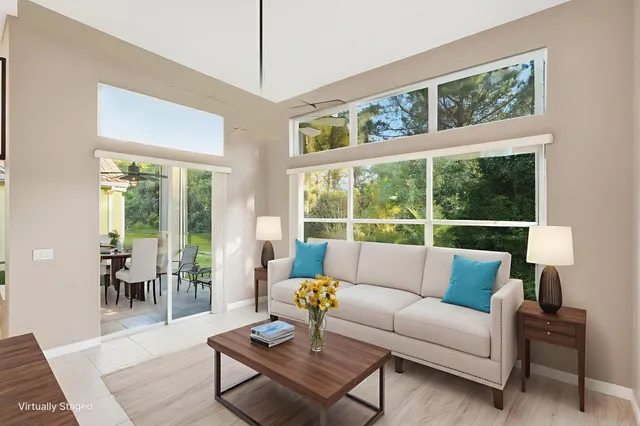 a view of a dining room with furniture window and outside view