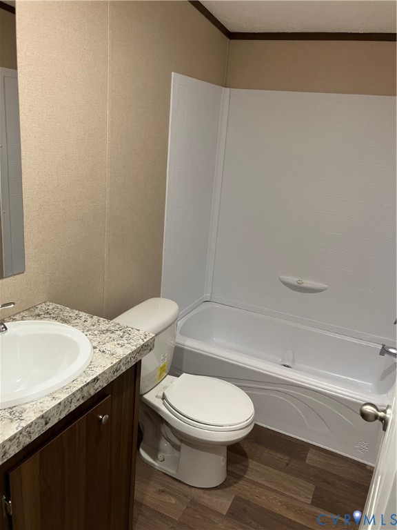 2664 Overton Road Victoria, VA 23974 - Photo 11 of 14 a bathroom with a granite countertop bathtub sink vanity mirror and toilet
