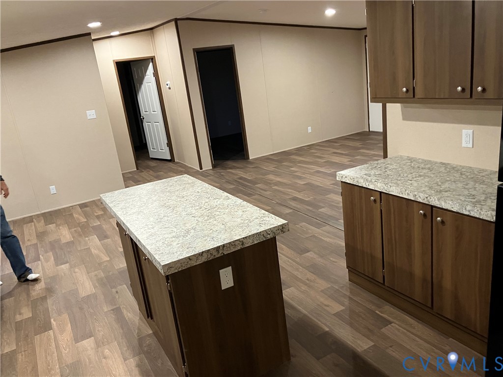 2664 Overton Road Victoria, VA 23974 - Photo 4 of 14 a kitchen with a sink a refrigerator and wooden floor