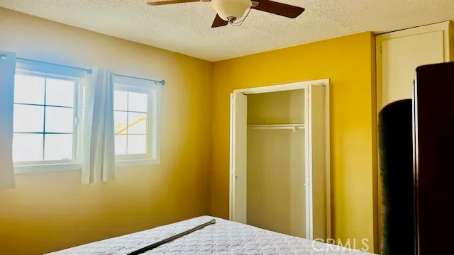 a view of a room with windows