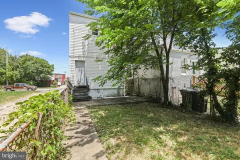 a view of a backyard with a garden