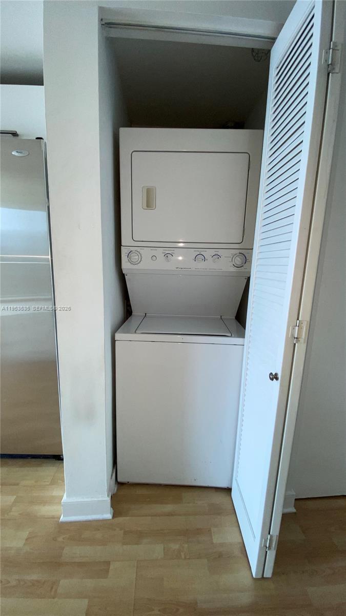185 Southwest 7th Street, Unit 3706 Miami, FL 33130 - Photo 13 of 26 a utility room with a washer and dryer