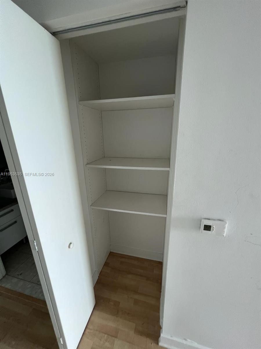 185 Southwest 7th Street, Unit 3706 Miami, FL 33130 - Photo 14 of 26 a view of walk in closet