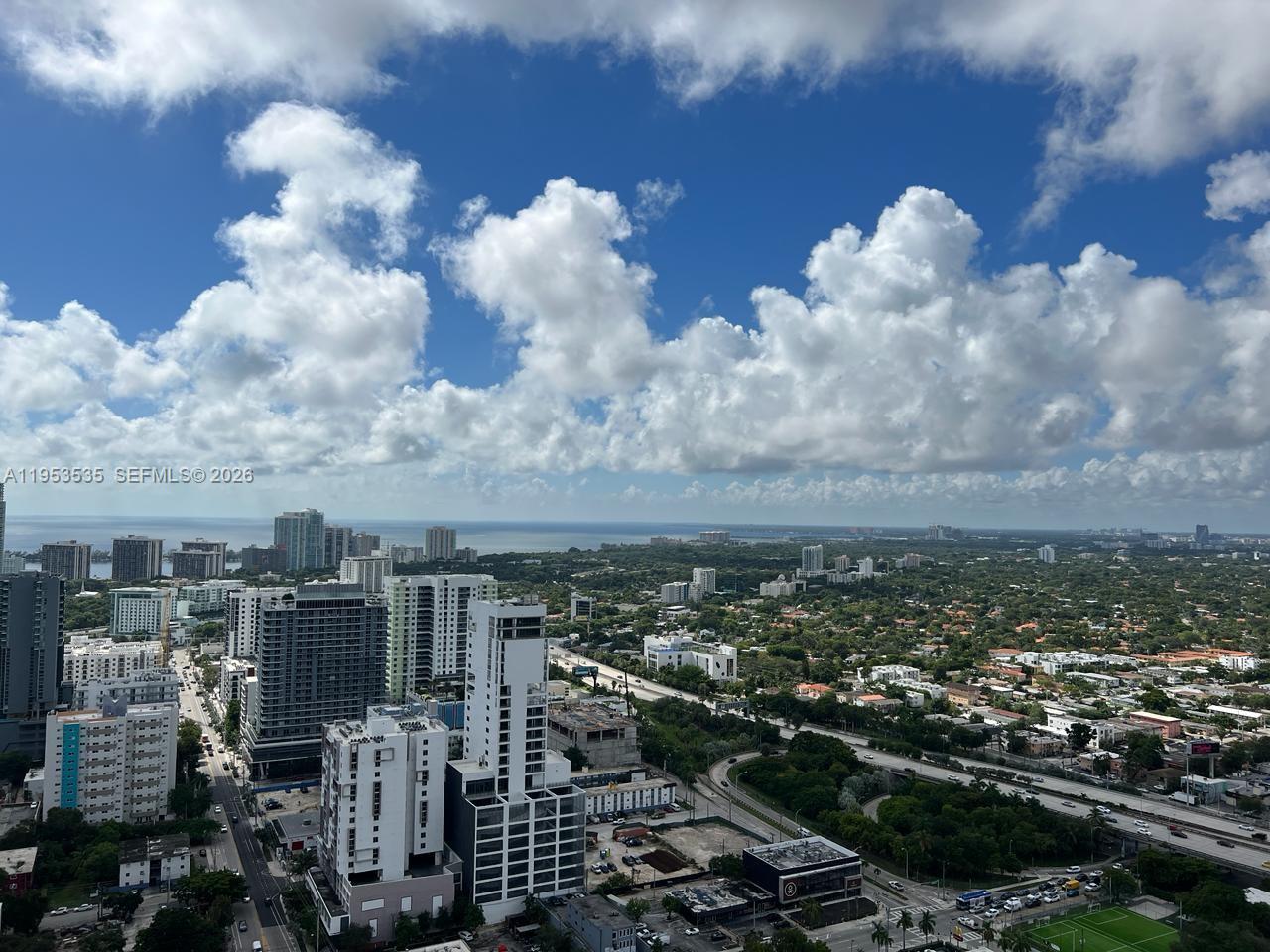 185 Southwest 7th Street, Unit 3706 Miami, FL 33130 - Photo 25 of 26 an aerial view of a city