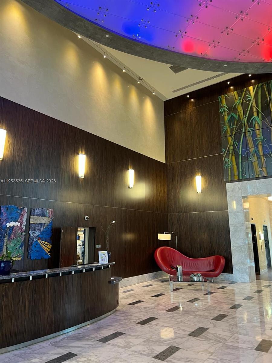 185 Southwest 7th Street, Unit 3706 Miami, FL 33130 - Photo 5 of 26 a view of a room with gym equipment