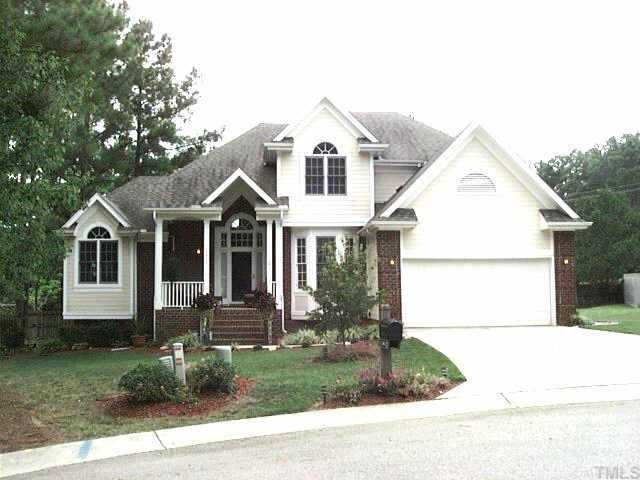 3813 Evander Way Raleigh, NC 27613 - Photo 1 of 1 a front view of a house with a yard and garage