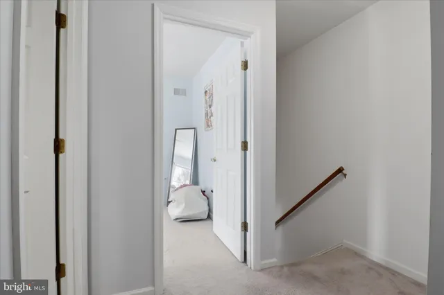 a view of a bathroom with a sink and a bathroom