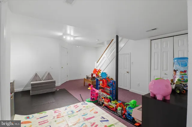 a view of a workspace with furniture