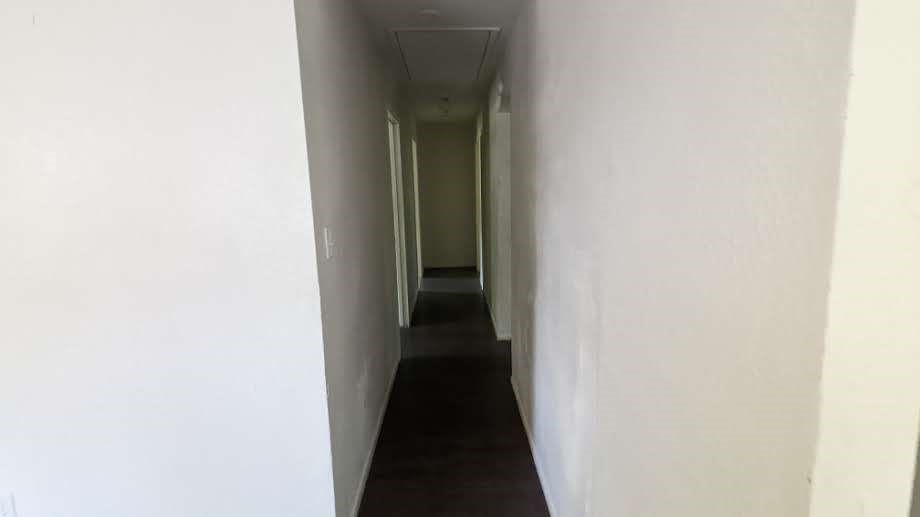215 Blackshear Street Tomball, TX 77375 - Photo 7 of 12 a view of a hallway