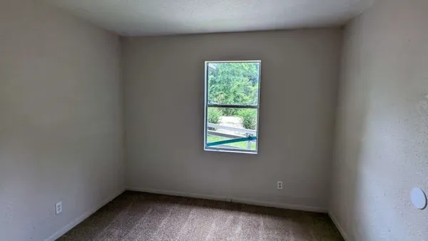 an empty room with a window