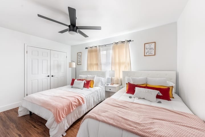 5700 Signal Point Austin, TX 78724 - Photo 12 of 16 Bedroom featuring a closet, wood finished floors, and a ceiling fan