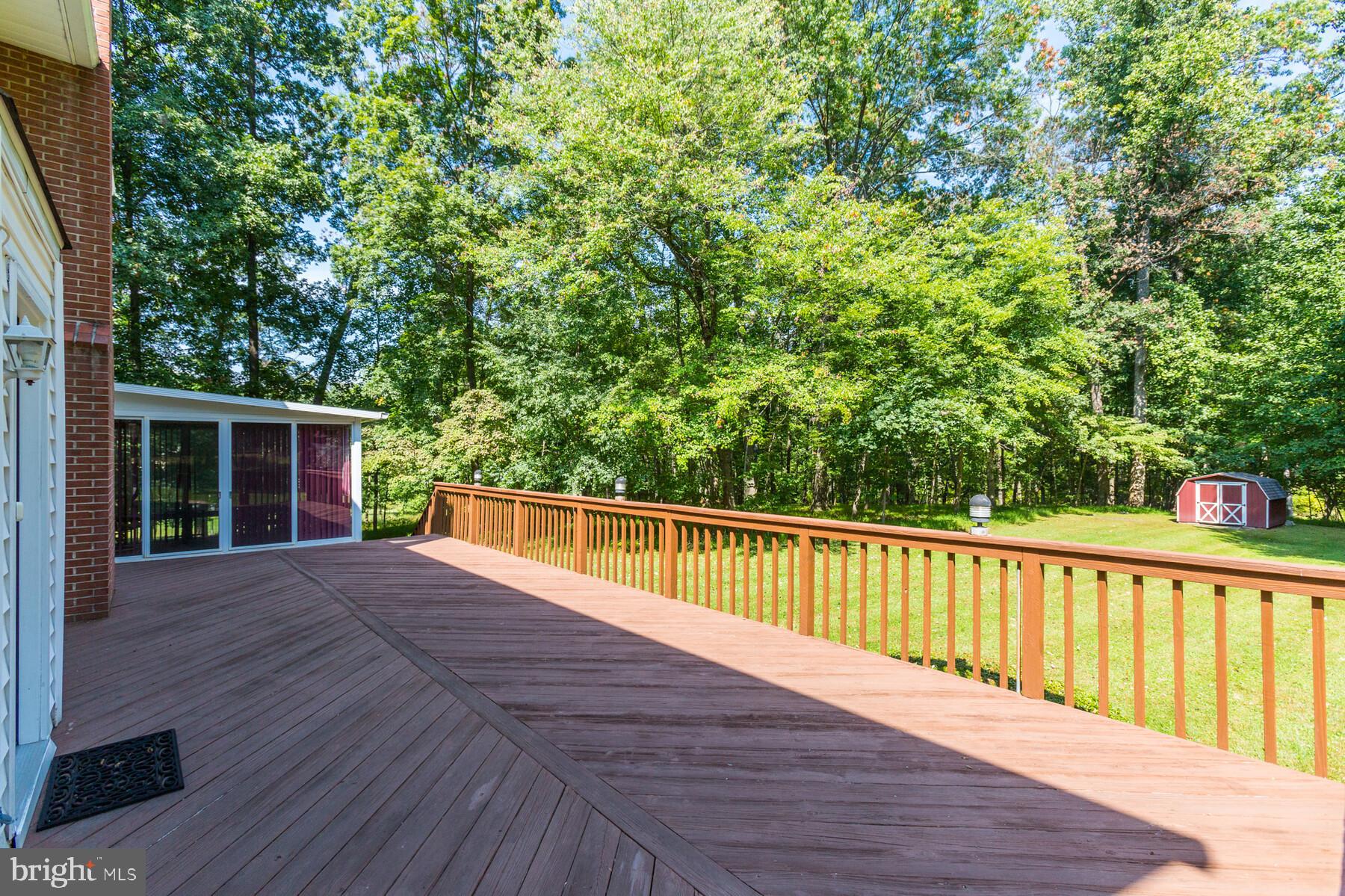 11798 Frederick Road Ellicott City, MD 21042 - Photo 20 of 33 Enormous deck with retractable awning