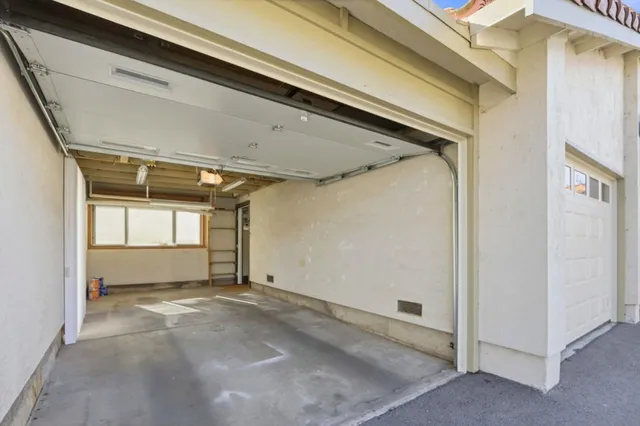 a view of a room with a large window