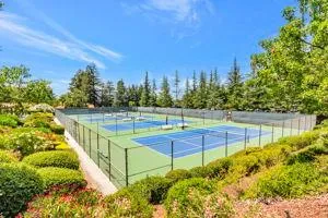 a view of a chairs and table in the deck