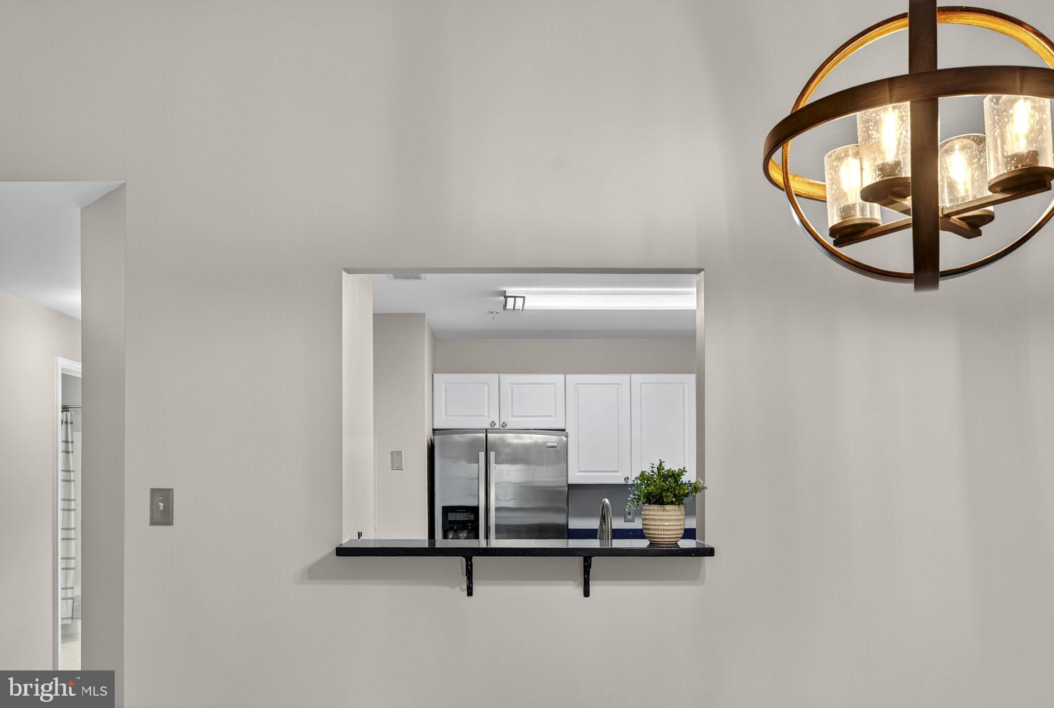 44084 Natalie Terrace, Unit 301 Ashburn, VA 20147 - Photo 20 of 59 View Into Kitchen