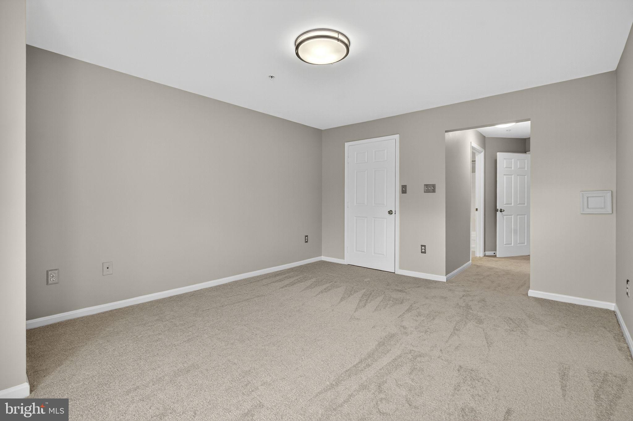 44084 Natalie Terrace, Unit 301 Ashburn, VA 20147 - Photo 28 of 59 a view of an empty room
