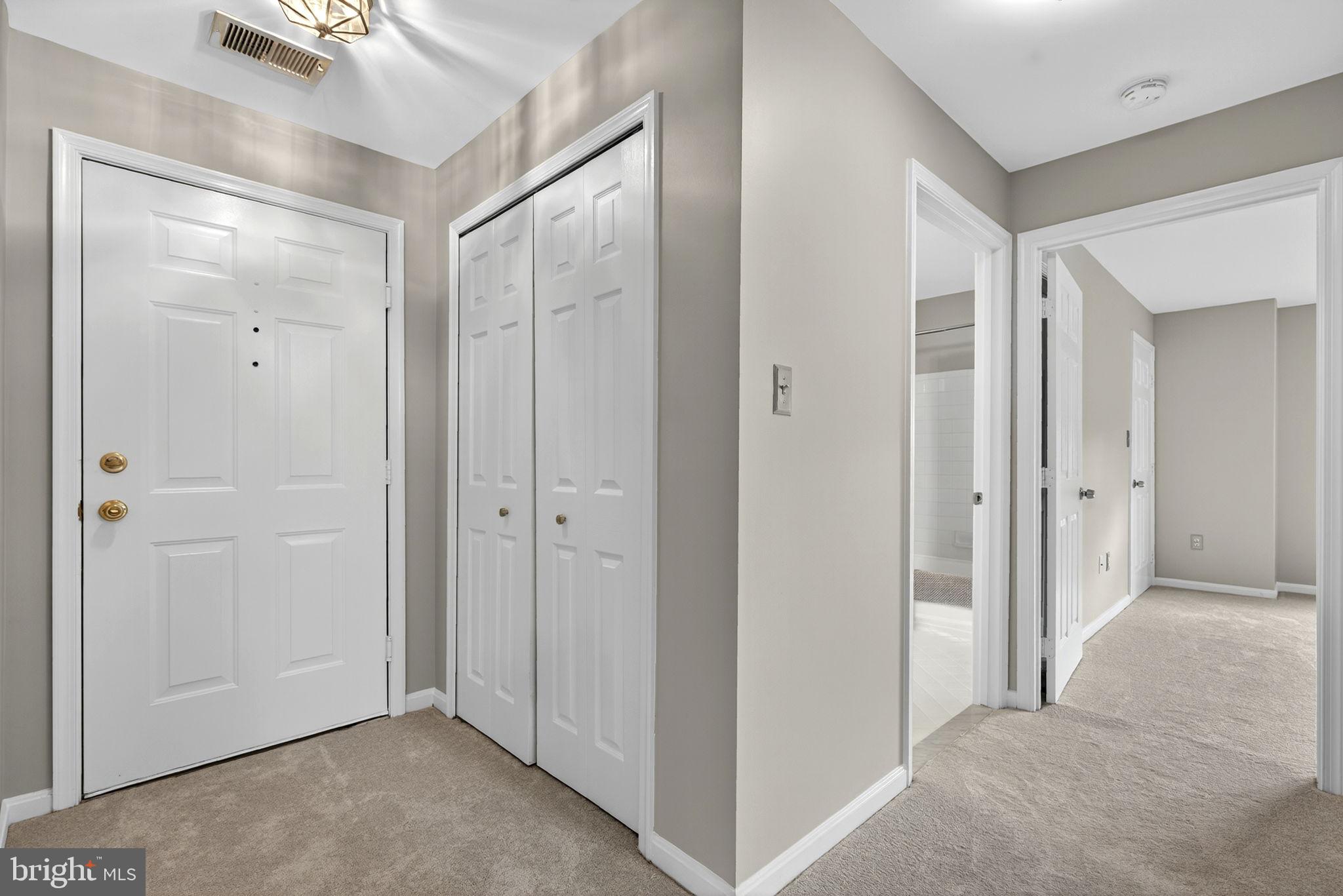 44084 Natalie Terrace, Unit 301 Ashburn, VA 20147 - Photo 59 of 59 a view of a hallway with closet area