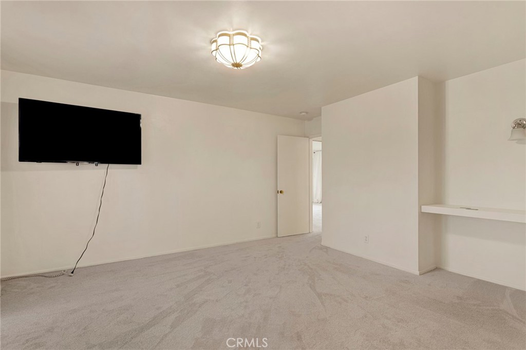 15177 Mendota Road North Apple Valley, CA 92307 - Photo 15 of 50 a view of a livingroom with a flat screen tv