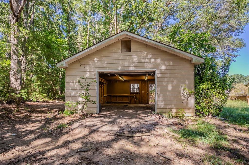 926 Bell Road Southeast Conyers, GA 30094 - Photo 27 of 30 a front view of a house with a yard