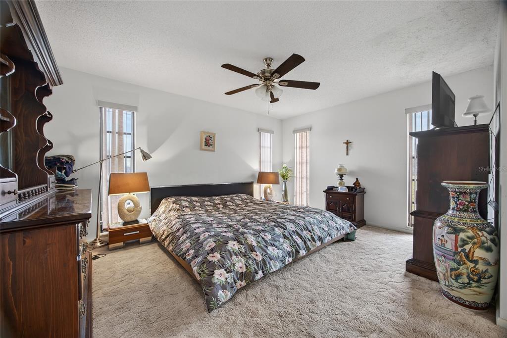 2484 Broad Ranch Drive Port Charlotte, FL 33948 - Photo 16 of 43 a bedroom with bed and window