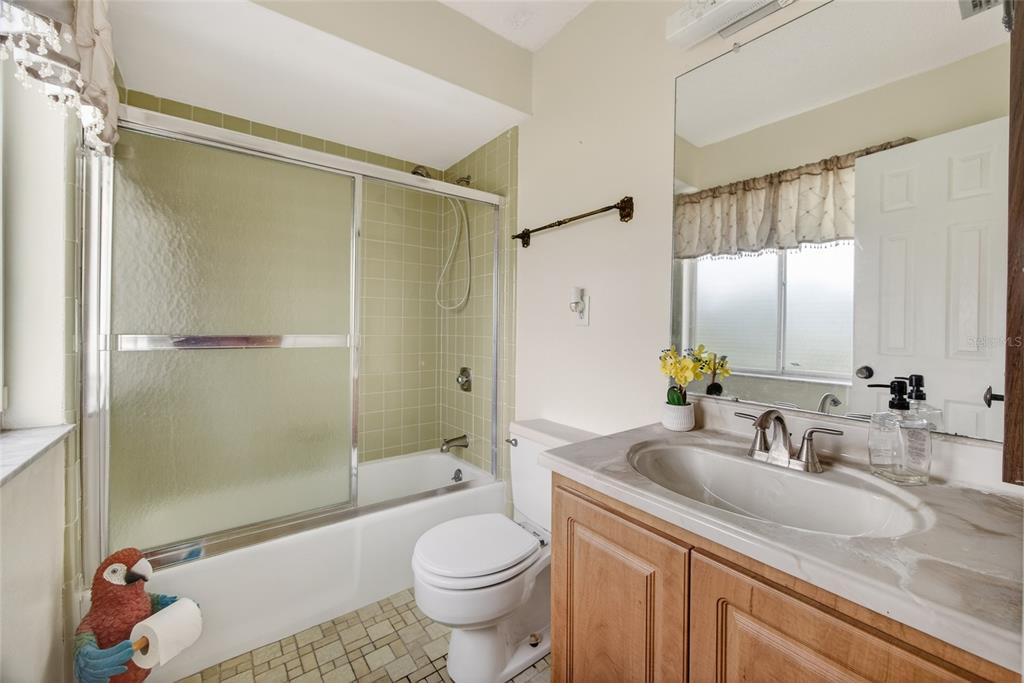 2484 Broad Ranch Drive Port Charlotte, FL 33948 - Photo 21 of 43 a bathroom with a sink toilet and shower