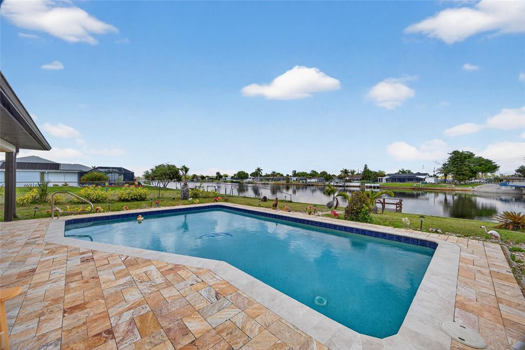 2484 Broad Ranch Drive Port Charlotte, FL 33948 - Photo 24 of 43 a view of swimming pool with outdoor seating